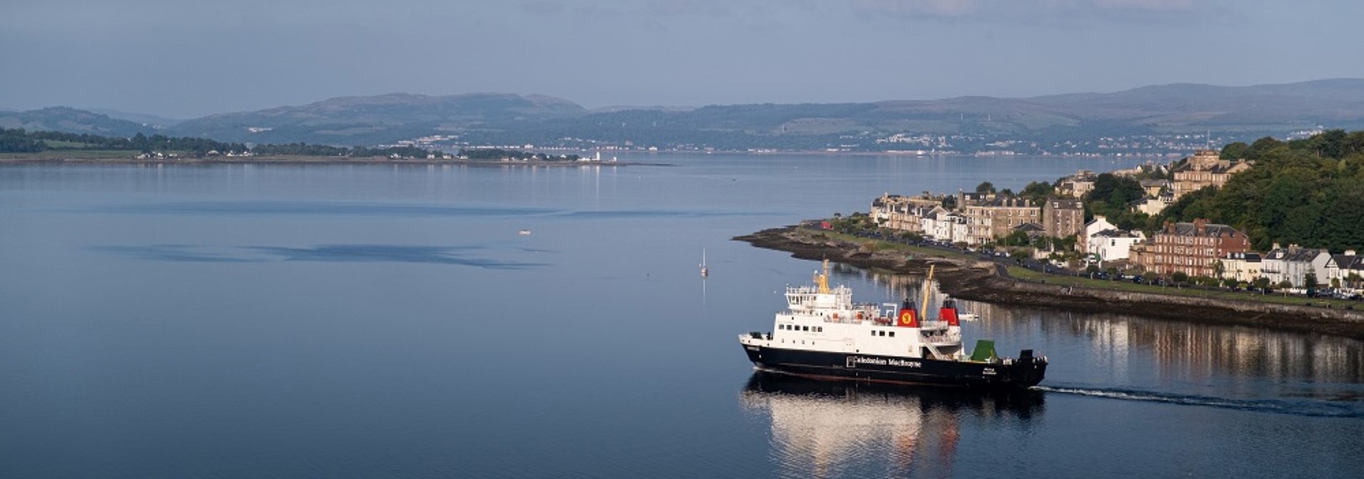 Ariel view of MV Bute sailing into Rothesay harbour 