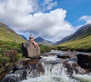 A lady enjoying the sunshine at Glen Rosa, Arran