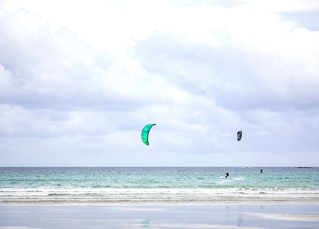 Kite surfer out at sea