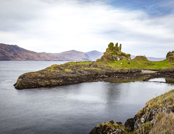 Castle Coeffin ruins, sitting on its lofted perch above the water, Lismore.