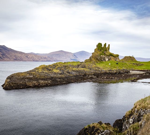 Castle Coeffin ruins, sitting on its lofted perch above the water, Lismore.