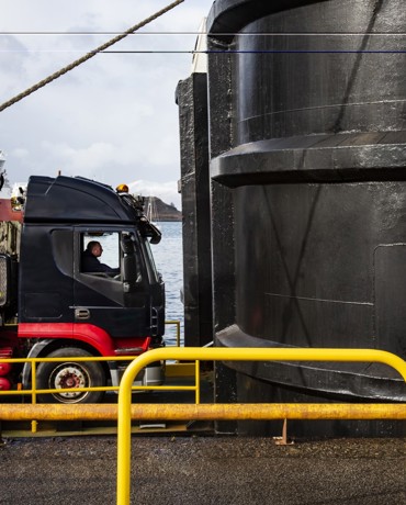 A large lorry driving onto a CalMac ferry