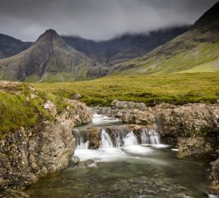  The Fairy Pools, with mountains in the background Isle Of Skye.