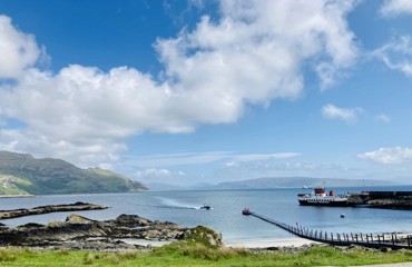 A CalMac ferry sitting berthed at the slipway, Kildonan on Morvern and Ardnamurchan