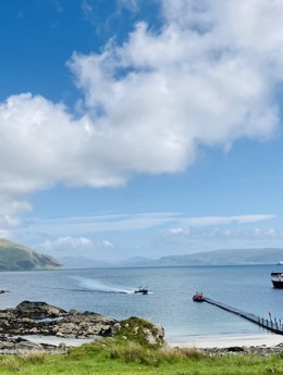 A CalMac ferry sitting berthed at the slipway, Kildonan on Morvern and Ardnamurchan