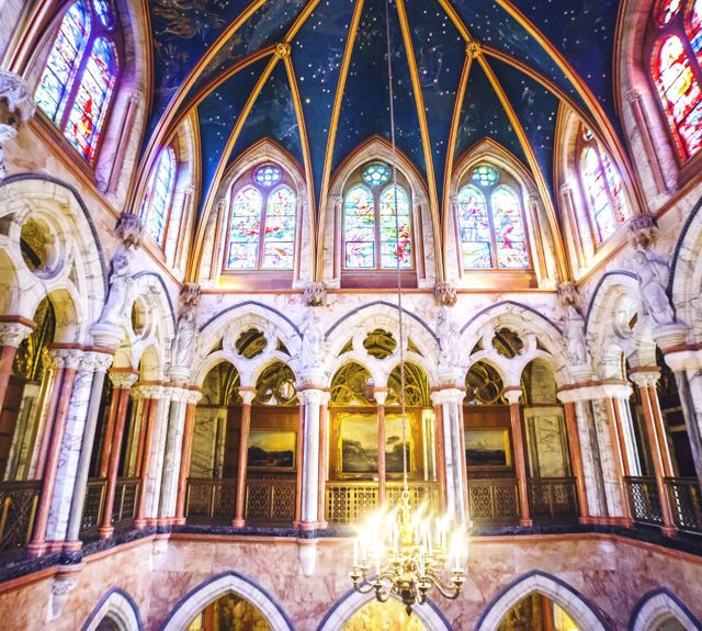 The arches and stained glass windows inside Mount Stuart 