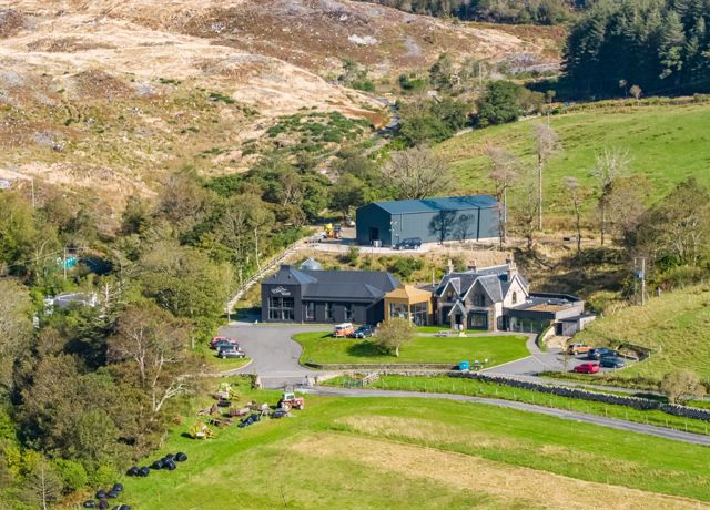 A view of the buildings and land of the Isle Of Raasay Distillery, Raasay.