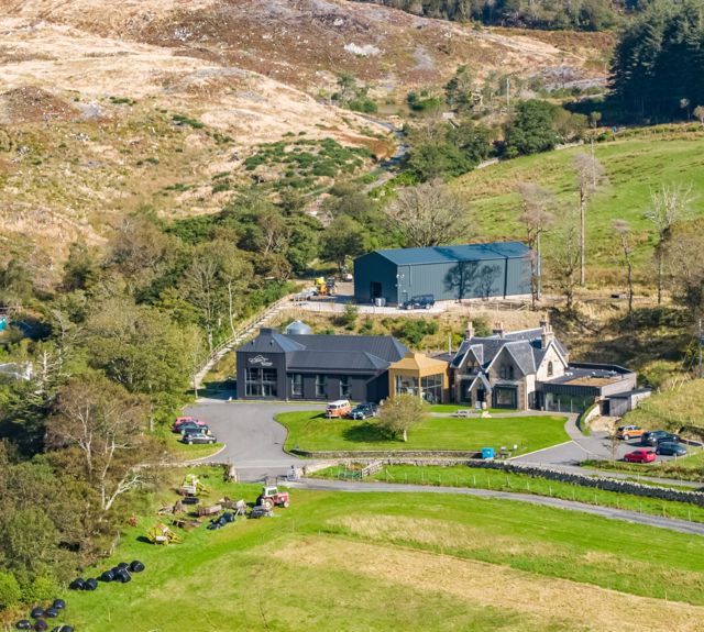 A view of the buildings and land of the Isle Of Raasay Distillery, Raasay.