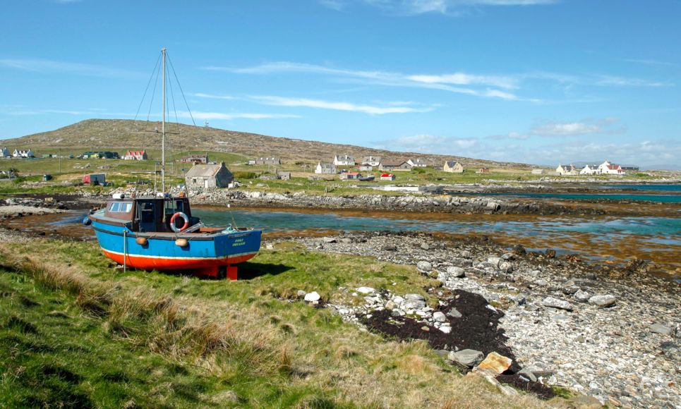  Isle of Berneray - A village with a ship in the foreground