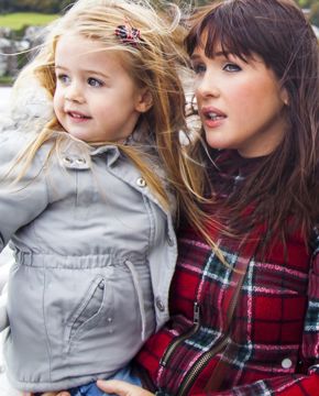 A mother and daughter enjoying a trip outside on the CalMac ferry to Bute.