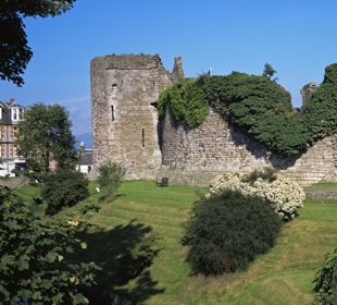 Rothesay Castle with trees in the foreground, Bute