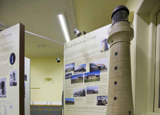 A model of the Skerryvorre Lighthouse and information boards, at the Skeyrryvorre Lighthouse Museum in Hynish on the Isle of Tiree.