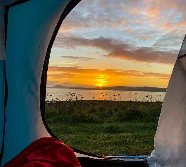 A sunset view from inside a tent, Barra