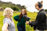 Nati Galloway filming on Eigg talking to another female to her left and the camera woman to her right