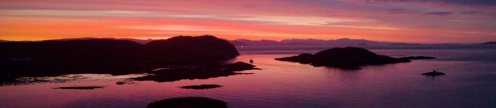 Purple and orange sunrise at the Isle of Coll, taken from a drone.