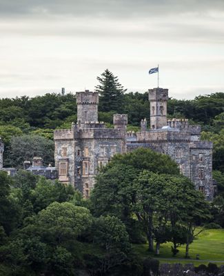 The turreted Lews Castle sits proudly in woodlands, Lewis.