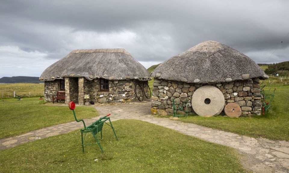 Stone cottages with thatched roofs at the Skye Museum Of Island Life, Skye.