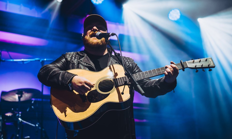 Cammy Barnes performing on stage at EDF
