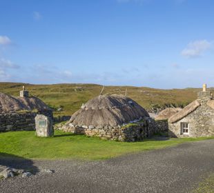 A Blackhouse village of old stone made, thatched roof crofting homes, Lewis.