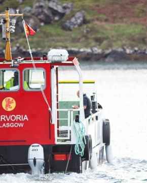 The small ferry MV Carvoria sails across to the Isle of Kerrera