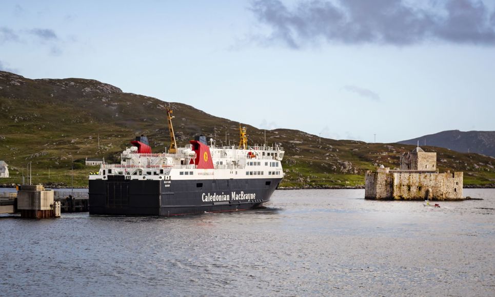 A Caledonian MacBrayne Ferry at Castlebay, Barra, next to Kisimul Castle.