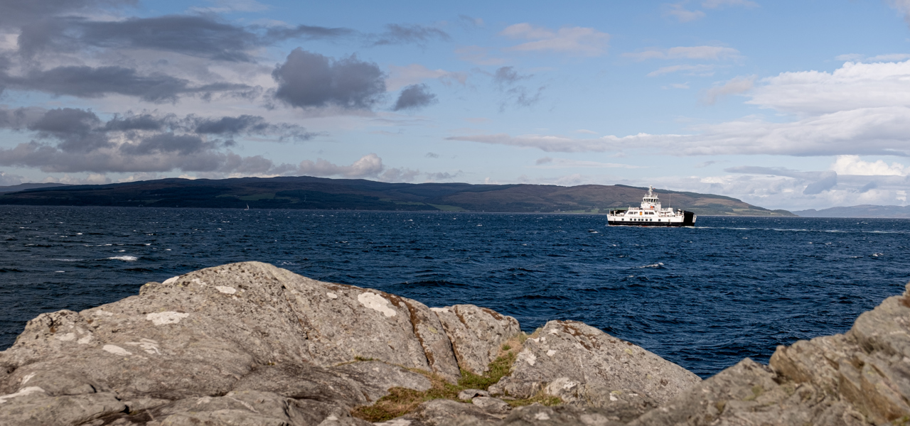 Caledonian MacBrayne ferry travelling between Lochranza and Claonaig