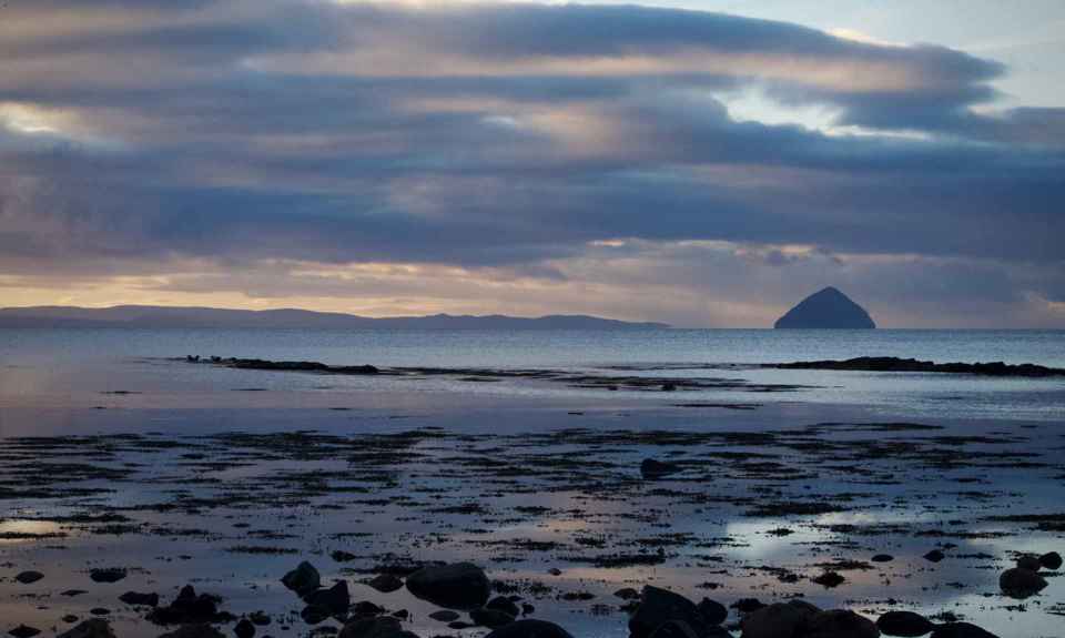 View from Arran of Ailsa Craig and Ayrshire coast at sunrise.
